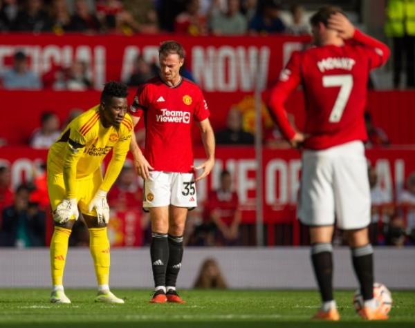 epa10905620 Manchester United's Andre o<em></em>nana (L) and Jo<em></em>nny Evans (R) react after the first goal during the English Premier League match between Manchester United and Brentford in Manchester, Britain, 07 October 2023. EPA/PETER POWELL EDITORIAL USE ONLY. No use with unauthorized audio, video, data, fixture lists, club/league logos or 'live' services. o<em></em>nline in-match use limited to 120 images, no video emulation. No use in betting, games or single club/league/player publications.