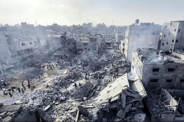 Palestinians searching through the rubble after a strike on the Jabalia refugee camp in the Gaza Strip.