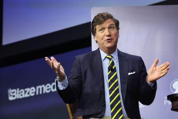 Tucker Carlson on stage.