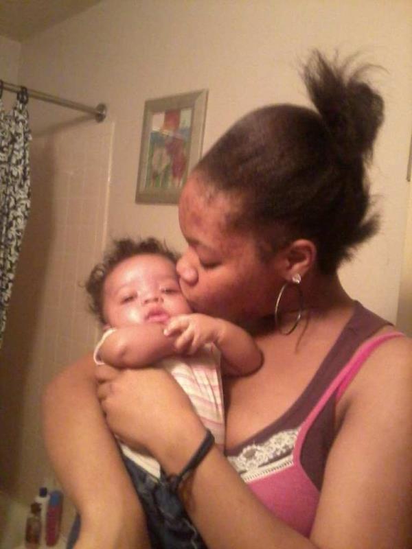Photo of Dearria Radley as a baby with mother 