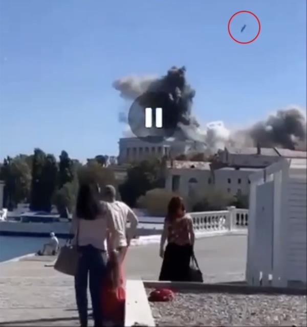 Ukraine hits Russian Black Sea Fleet headquarters in Sevastopol on September 22, 2023. Smoke rises above the headquarters building moments before a missilehits the building.
