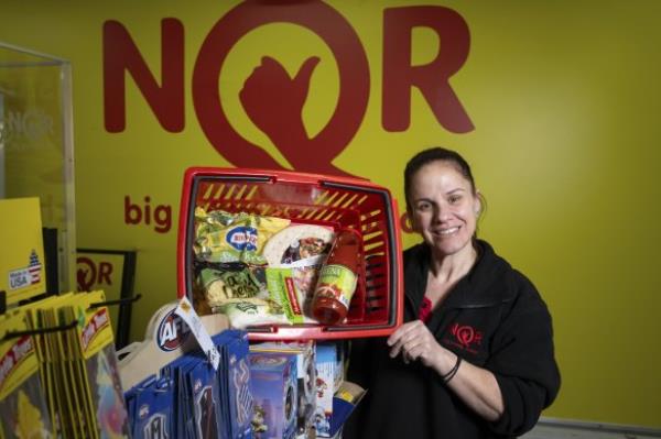 NQR area manager Janeta Gestakovski with $20 worth of groceries from the chain’s Sunshine West store. 