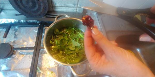 Add hot pepper or chili flakes to the 'pesto'