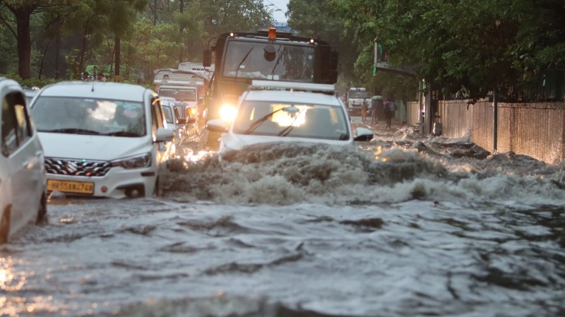 The natio<em></em>nal capital experienced heavy rainfall in the morning, leading to widespread waterlogging and significant traffic disruptions across the city.