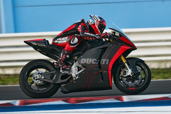 Motorcycle racer driving the Ducati MotoE 2023 electric motorcycle
