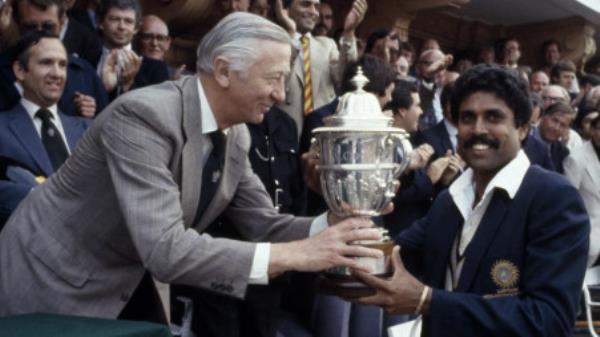Kapil Dev receiving the 1983 ICC World Cup trophy. Photo: ICC Website