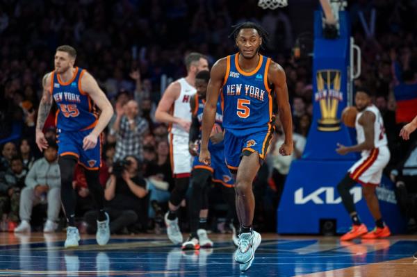 New York Knicks guard Immanuel Quickley (5) reacts after hitting a shot during the second half.