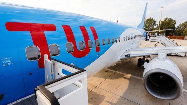 旅游业巨头途易在欧洲度假热潮中出人意料地公布了初冬利润