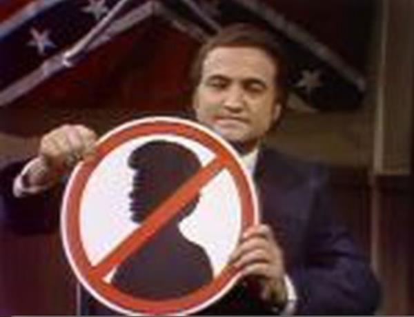 John Belushi as George Wallace