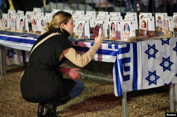 Palestinians look for survivors of the Israeli bombardment of the Gaza Strip in Rafah, Dec. 12, 2023.