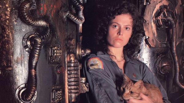 Sigourney Weaver holds a cat in Alien
